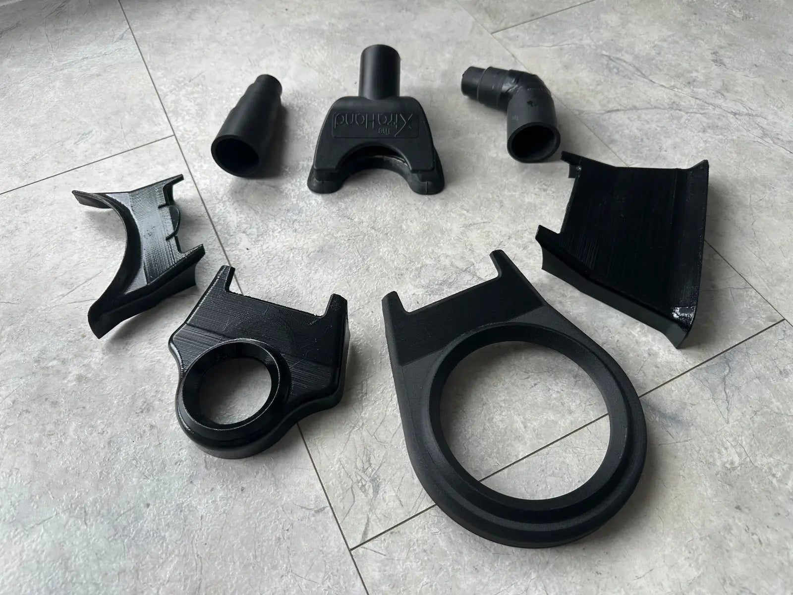 Different physical prototype iterations from the XtraHand V2 development programme