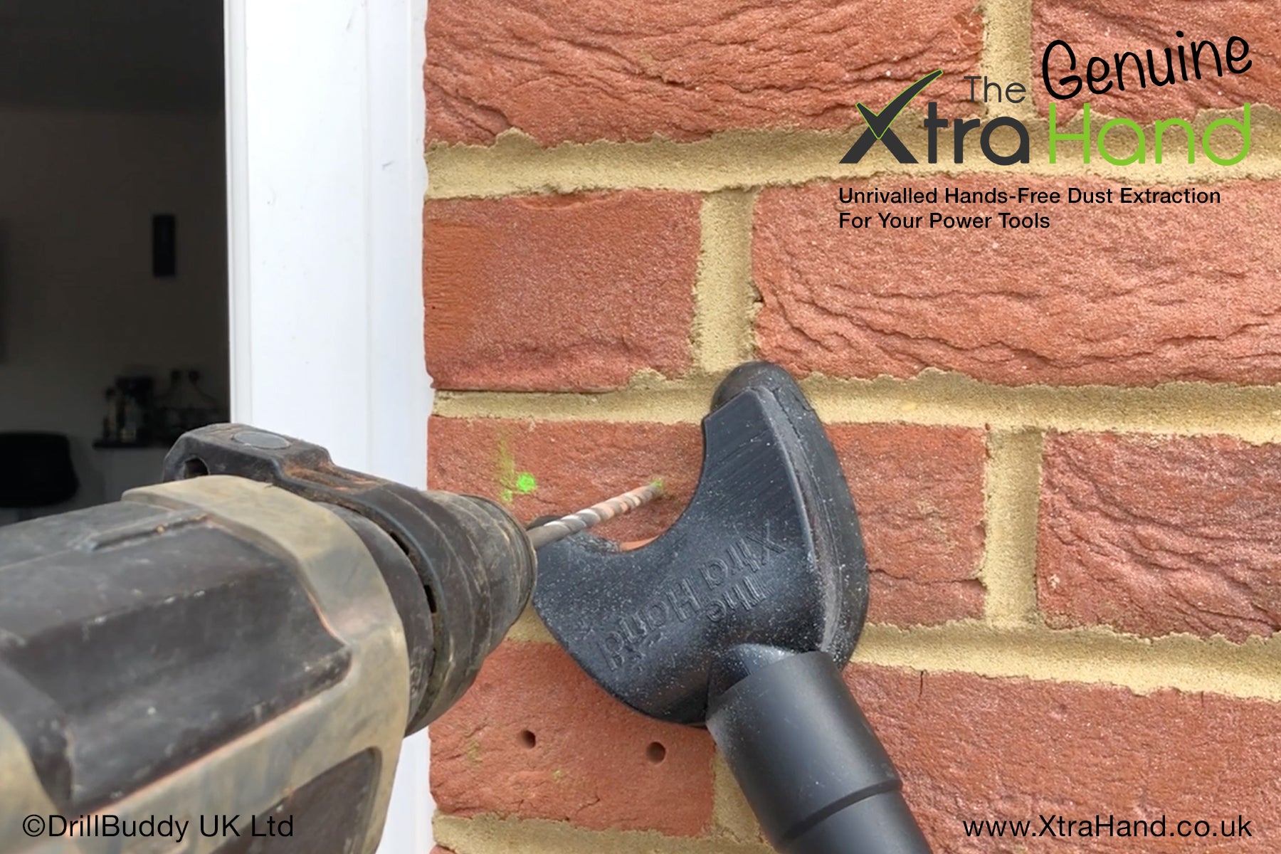 Using the Genuine XtraHand® hands-free dust extraction tool while drilling into a red brick wall to install a Ring Doorbell. Captures brick dust at source for cleaner, safer masonry drilling and improved visibility.